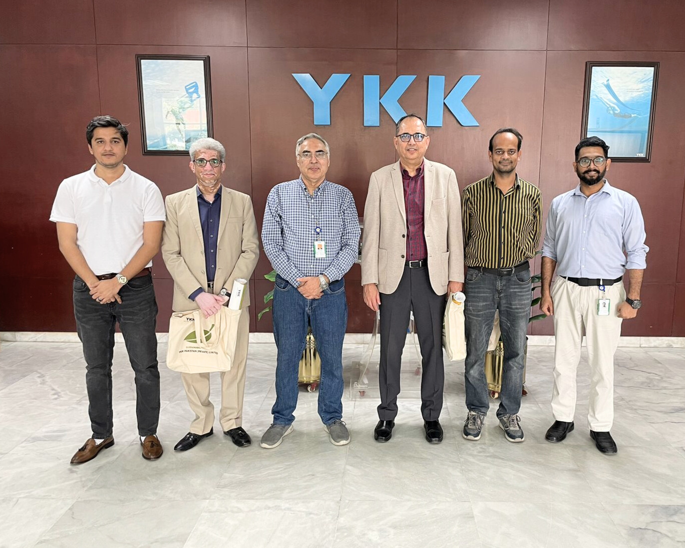 YKK PAK x TIP website Group Photo of YKK Pakistan team and TIP